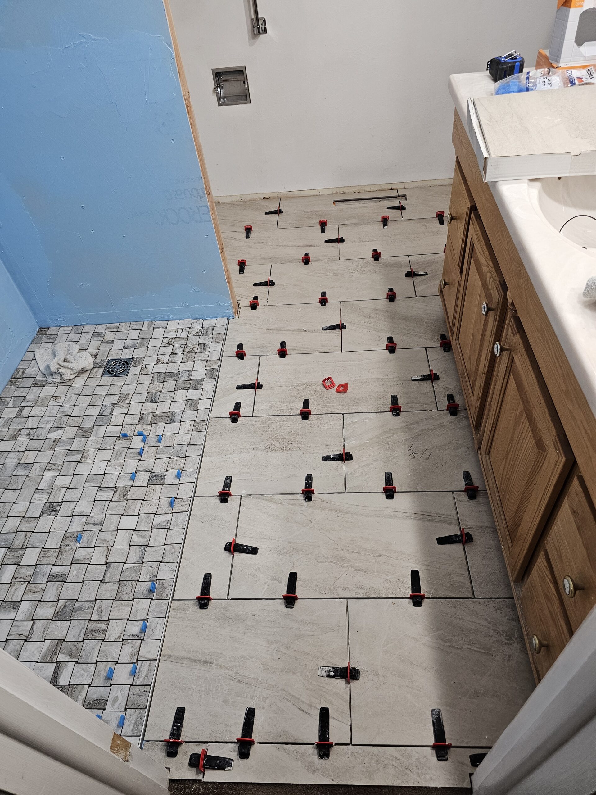 tile floor meets shower pan