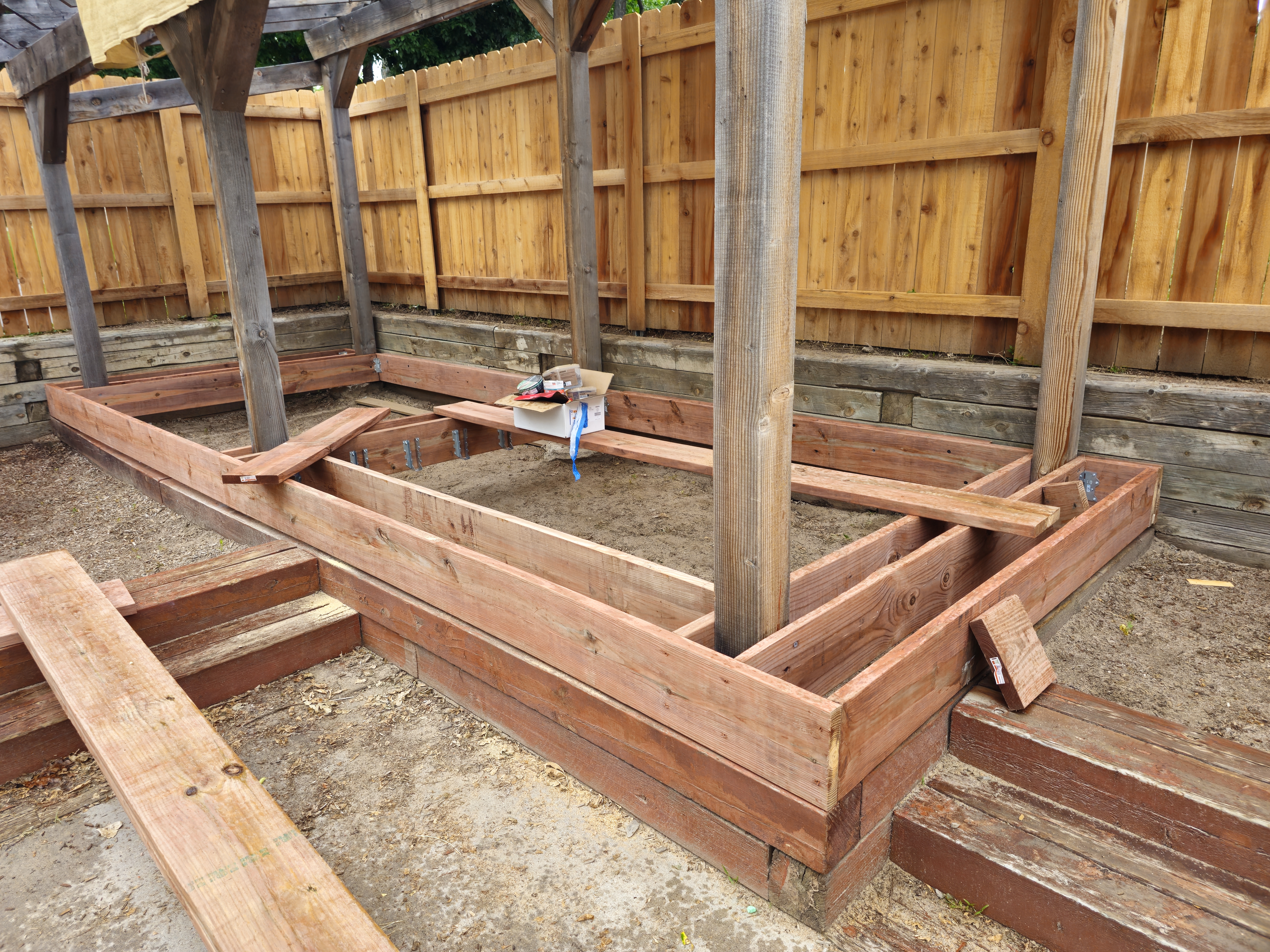 Deck framing layout under pergola structure
